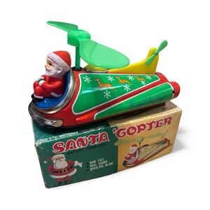 Vintage 1960’s Santa Copter Tin toy in original box - tested and works.
